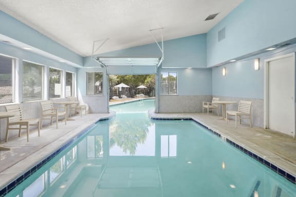 an indoor swimming pool at Horizon East Apartments in Aurora, CO