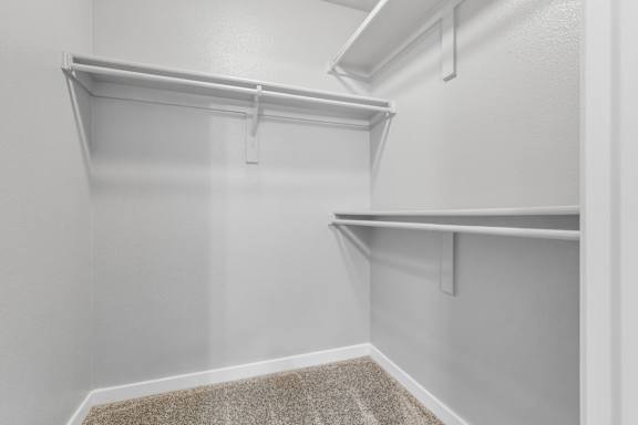 Walk in closet  at The Buttes Apartments Loveland, CO