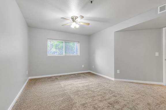 ceiling fan in bedroom  at The Buttes Apartments Loveland, CO