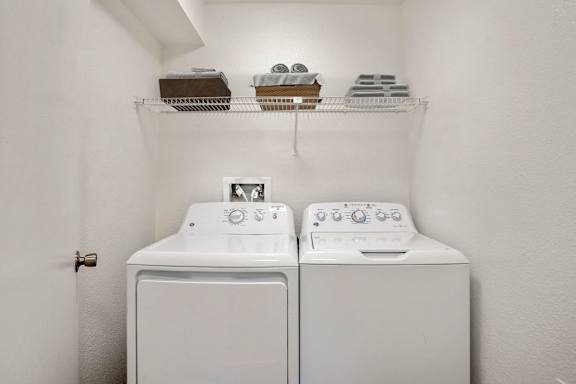 A Washer and Dryer at Horizon East Apartments in Aurora, CO.