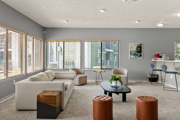 Clubhouse with couches and chairs at Horizon East in Aurora.