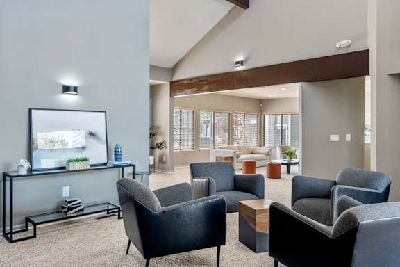 Clubhouse sitting area with chairs at Horizon East in Aurora.