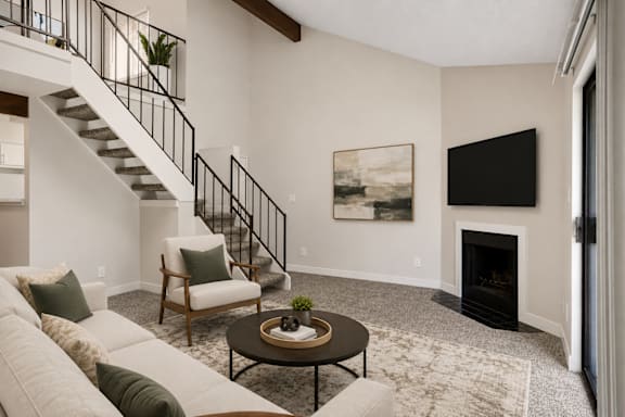 A living room with a fireplace at Hilltop View in Denver, CO
