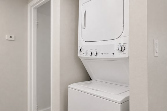 In unit washer and dryer at Hilltop View Apartments