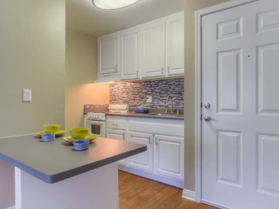 Gourmet Kitchen with Breakfast Bar and Pantry at Twenty 2 Eleven Apartments, Canoga Park, 91306