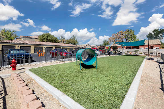 Whether you're relaxing on a bench or engaging with your pup on the agility equipment, our dog park offers a welcoming and safe space for all.