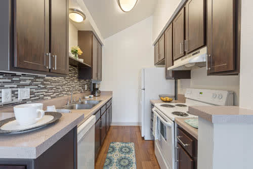 Fully Furnished Kitchen With Stainless Steel Appliances at Independence Plaza, Canoga Park