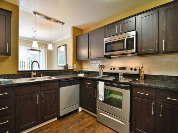 Gourmet Kitchens with Islands, Caesarstone Countertops, and Decorative Backsplash at Crooked Oak at Loma Verde Preserve, California, 94949