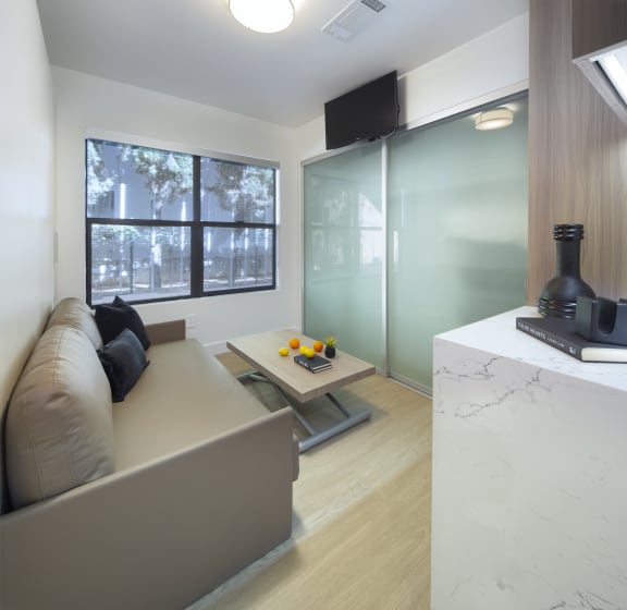a living room with a couch and a coffee table