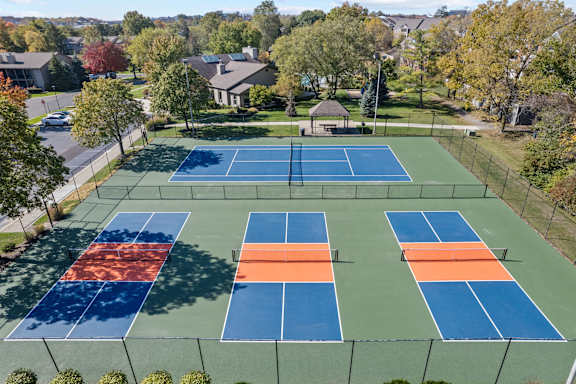 Aerial view of the tennis courts at Lakes of Carmel Apartments, Indiana, 46032