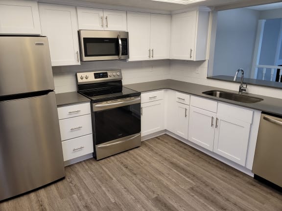 Kitchen Cabinets at Woodland Springs Apartment Homes, Indiana, 46033