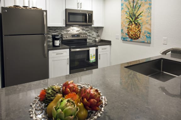 a kitchen with a bowl of fruit on the counter at Club Pacifica, Benicia California
