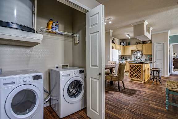 A laundry room with a washer and dryer.