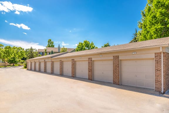 A long row of garage doors are closed.