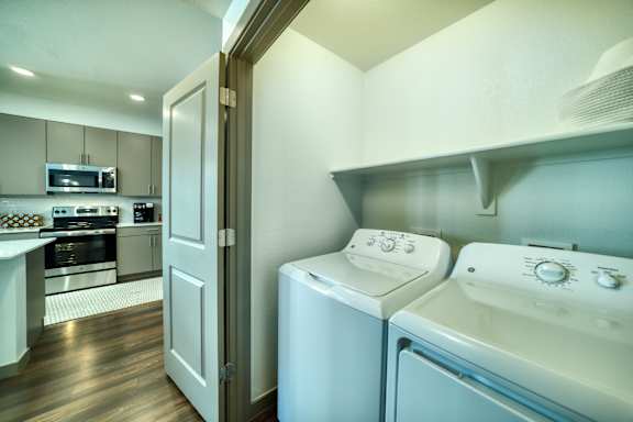 A laundry room with a washer and dryer.