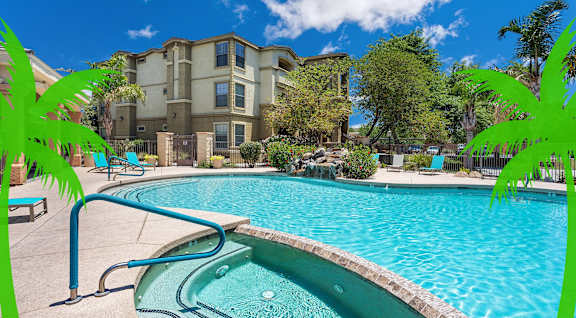 a swimming pool with a building in the background at Superstition Canyon Apartments, Arizona