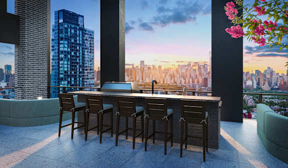 A modern bar with a view of the city skyline at dusk.