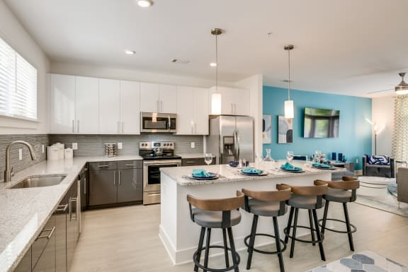 Modern Kitchen with White Cabinet at Link Apartments&#xAE; Grant Park, Atlanta, GA