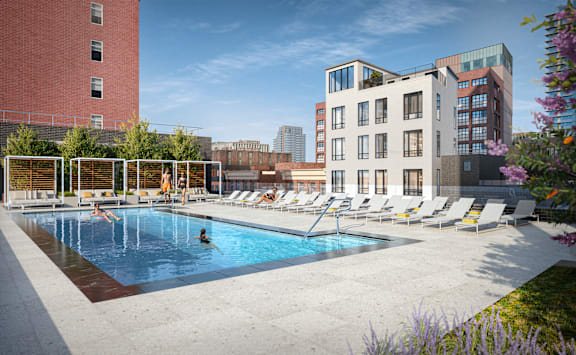 a view of the rooftop pool at the graduate madison hotel in madison, wi