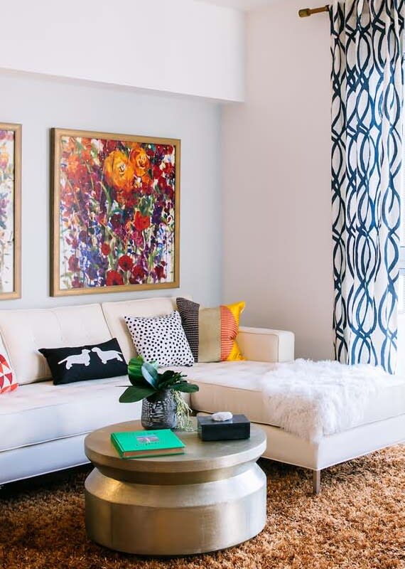 Decorated living room with natural light at Block C apartments