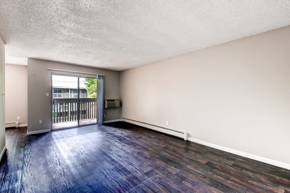 Unfurnished Living Room at 3300 Tamarac Apartments