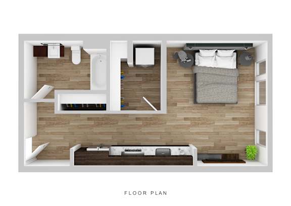 A floor plan of a small apartment with a bedroom, living room, and kitchen.