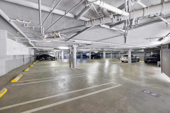 parking garage with vehicles. at The Hilgard, California, 90024