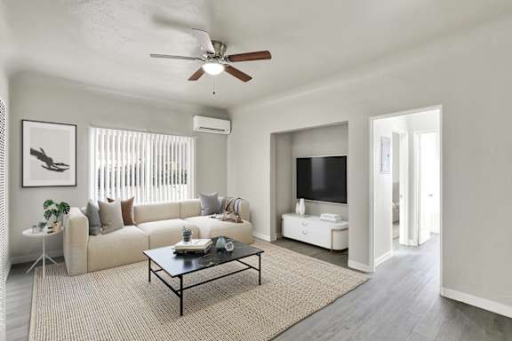 Living Room With Ceiling Fan at Barton Apartments, California, 90038