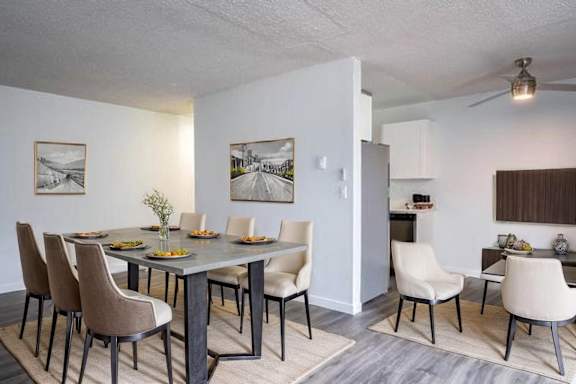 Floor Plan  A dining room with a table set for six.