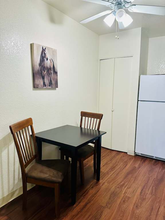 Small table with two chairs in a room at Mountain Vista, Sierra Vista, 85635