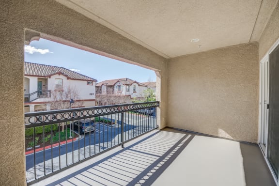 a balcony with a view of a street and houses  at Monarch at Dos Vientos, California, 91320