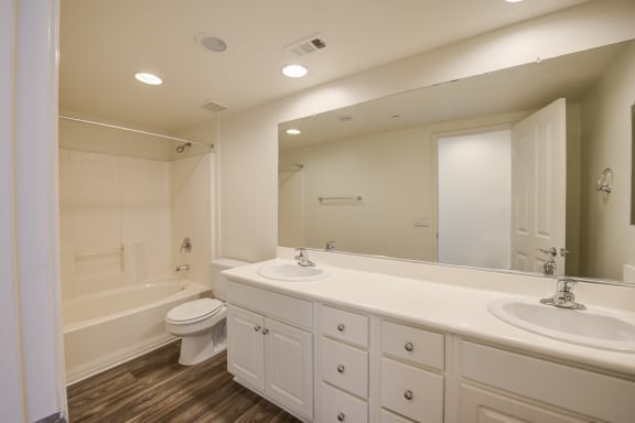 a bathroom with a toilet sink and bathtub  at Monarch at Dos Vientos, Newbury Park, California