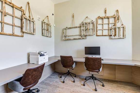 an office with two chairs and a computer at The Vineyards Apartments, California, 91326