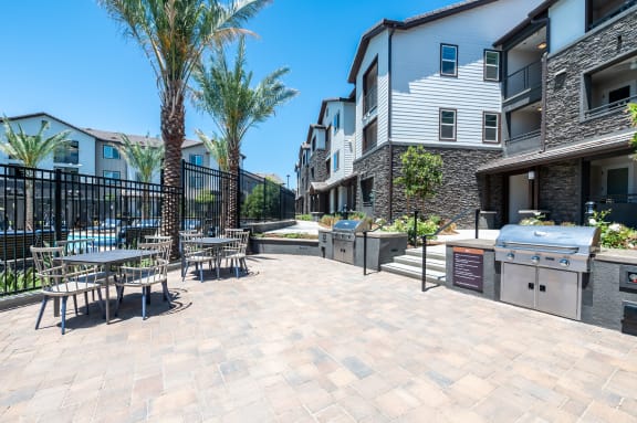 the patio at the enclave at woodbridge apartments in sugar land, tx at The Vineyards Apartments, Porter Ranch, California