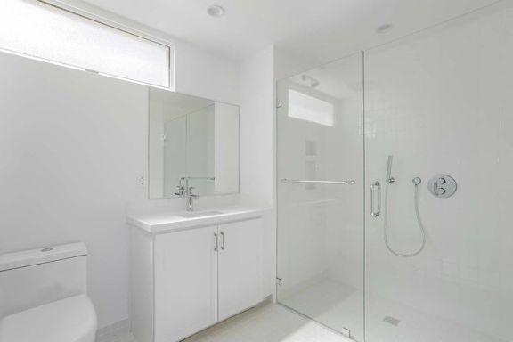 Bathroom with shower at The Lucky Apartments, Culver City, California