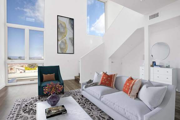 Living room with natural light at The Lucky Apartments, California, 90066
