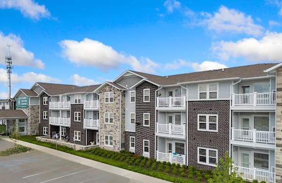 an exterior view of an apartment building on a street at 41 North Senior Living Apartments, Indiana 46835