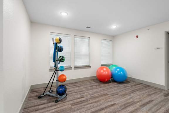 fitness room with balls and exercise equipment at 41 North Senior Living Apartments, Fort Wayne, Indiana