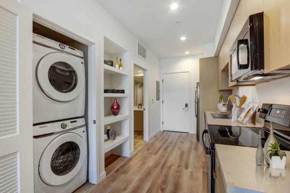 a laundry room with a washer and dryer