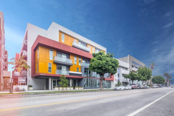 a rendering of a building on a city street