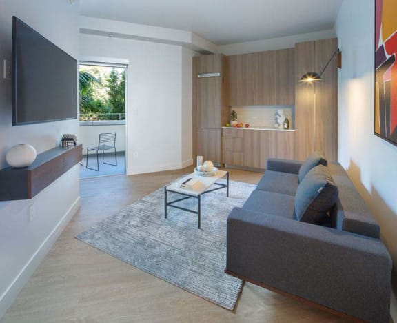 a living room with a couch and a table