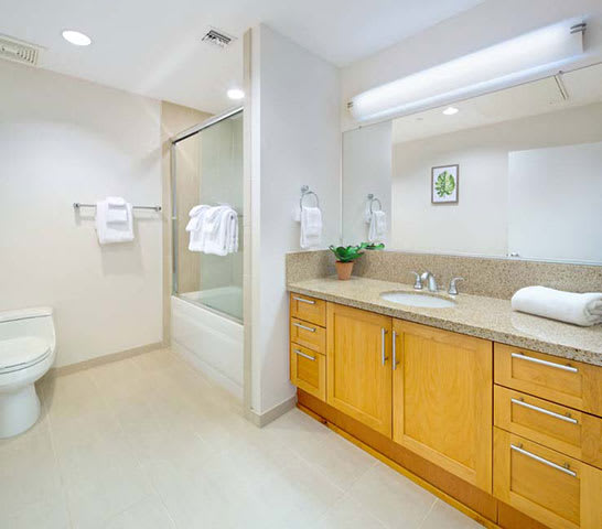 a bathroom with a sink toilet and a shower a bathroom with a sink toilet and a shower at Wilshire Margot, Los Angeles