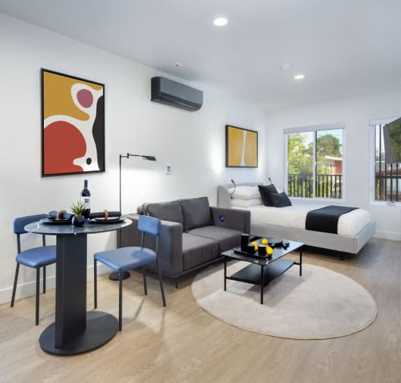 Floor Plan  a living room with a couch and a table