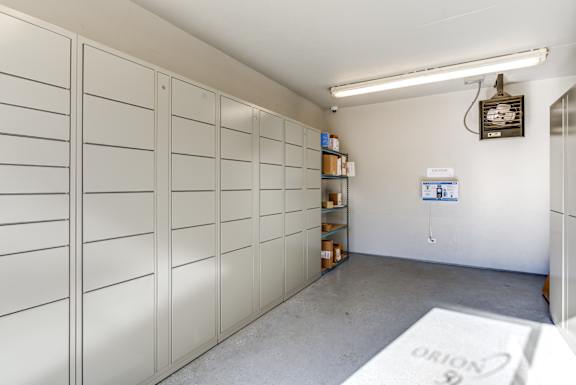 Storage room with lockers at fifty9 Grove Apartments, Naperville, 60563