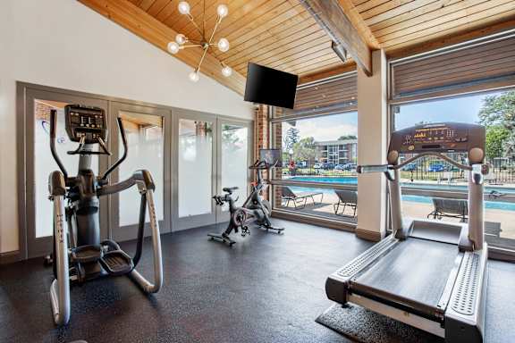 Gym with equipment at fifty9 Grove Apartments, Naperville, IL, 60563