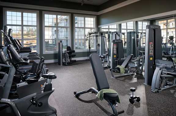 A gym with a row of treadmills at Meridian West Shore, Mechanicsburg, 17055
