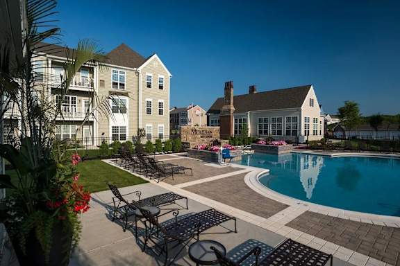 Pool With Lounge Chairs at Meridian West Shore, Pennsylvania