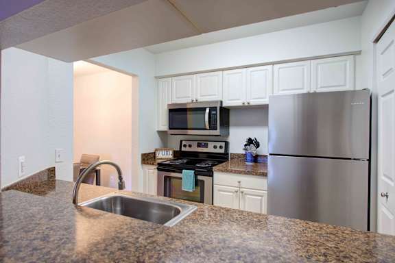 Stainless steel refrigerator at Pine Ridge Apartments, Rochester Hills, Michigan
