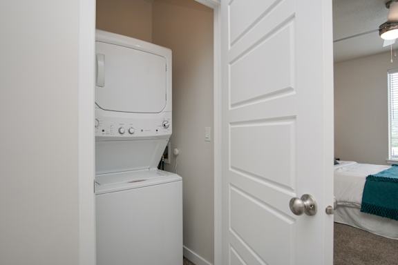 Inunit washer dryer with white door at Liberty Point Apartments, Draper, 84020