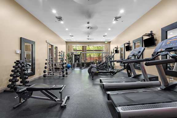 Fitness center with cardio and weight equipment at Liberty Gateway Apartments, Salt Lake City, Utah
